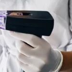Morpheus8 RF microneedling device used by a medical professional for skin tightening